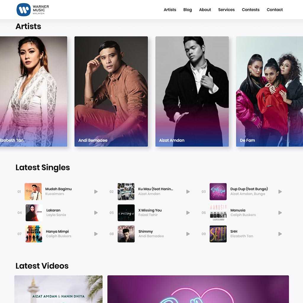 Simple and clean website design for Warner Music Malaysia on desktop view.